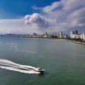 pilot boat approaching a ship in santos harbour Royalty Free Stock Photo