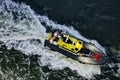 Pilot Boat Racing Through Rough Water