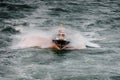 Pilot boat seen from the sky sailing in the middle of a storm Royalty Free Stock Photo