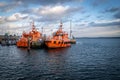 two pilot boats are in the harbor of Luebeck Travemuende