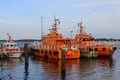 Pilot boats and life boat moored at port