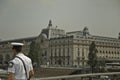 Pilot on the bridge Pont des arts in Paris Royalty Free Stock Photo