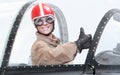 Pilot in cockpit.