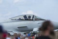 Pilot in the cockpit of a modern jet fighter.