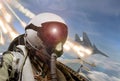 Pilot cockpit view during air to air combat with missiles flares chaff being deployed Royalty Free Stock Photo