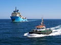 Pilot Cutter Escorting Offshore Vessel. Royalty Free Stock Photo