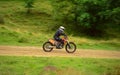 Pilot on enduro motorcycle off road