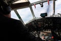 Aviation. A cockpit. Pilot is in the cockpit.