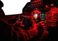 Pilot hands expertly control aircraft cockpit instruments during night flight Royalty Free Stock Photo