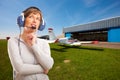 Pilot with headset outside Royalty Free Stock Photo