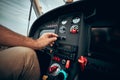 Pilot inside a cockpit small airplane. Pilots hand on the controls Royalty Free Stock Photo