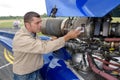 pilot or mechanic working on aircraft Royalty Free Stock Photo