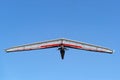 Pilot on modern high performance hang glider