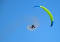 Pilot performing aerobatics stunts with a paramotor at the Kaivopuisto Air Show in Helsinki, Finland.