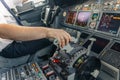 Pilot is piloting airplane from airplane cockpit