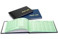 The pilot\'s flight log books on the table, one is open and blank Royalty Free Stock Photo