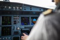 Pilot`s hand accelerating on the throttle in airplane flight cockpit during takeoff Royalty Free Stock Photo