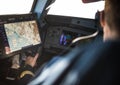 Pilot`s hand accelerating on the throttle in airplane flight cockpit during takeoff Royalty Free Stock Photo