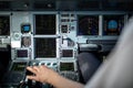 Pilot`s hand accelerating on the throttle in  a commercial airliner Royalty Free Stock Photo