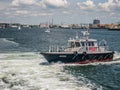 Boston Bay - a pilot ship near a big ship