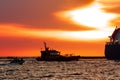 Pilot ship catches big container ship Royalty Free Stock Photo