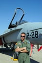 Pilot standing by F/A-18 Hornet.