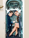 Pilot and Stewardess. Wishes a successful flight. Avia company persons crew pilots stewardess airplane command civil Royalty Free Stock Photo