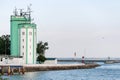 Pilot tower in seaport. Sea traffic control and ships management. Tower for logistic, monitoring wind speed and direction of flow