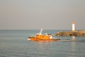 Pilot vessel leaving the port of Ventspils Royalty Free Stock Photo