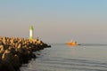 Pilot vessel leaving the port of Ventspils, pier view Royalty Free Stock Photo
