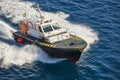 Pilot vessel operating on the sea. Harbor maritime control. Nautical Royalty Free Stock Photo