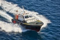 Pilot vessel operating on the sea. Harbor maritime control. Nautical Royalty Free Stock Photo