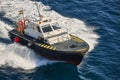 Pilot vessel operating on the sea. Harbor maritime control. Nautical Royalty Free Stock Photo
