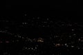 Pilot view over city with nightlights. Beautiful night backgrounds