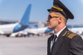 Confident aviator outside of airport Royalty Free Stock Photo
