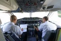 Pilots in aircraft cockpit