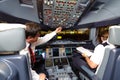 Pilots in aircraft after landing