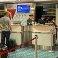 Pilots in a Delta gate preparing to fly out to their destination at the Orlando International Airport