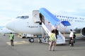 Pilots entering airplane Sriwijaya Air Royalty Free Stock Photo