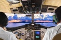 Pilots in the plane cockpit and island