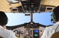 Pilots in the plane cockpit and sky Royalty Free Stock Photo