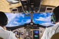 Pilots in the plane cockpit and sky Royalty Free Stock Photo