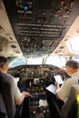 Pilots preparing aircraft for take-off Royalty Free Stock Photo