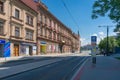 Pilsen street with tramway stop with public transport timetable