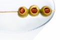 Martini olives on a skewer Royalty Free Stock Photo