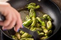 Pimientos de PadrÃ³n. Preparing Green Padron Peppers in the Frying Pan.