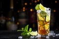 Pimms with cucumber, lime and ice - alcoholic cocktail drink with vodka, ginger beer and lemon juice, dark bar counter background Royalty Free Stock Photo
