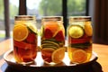 pimms-filled mason jars with citrus fruit slices