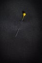 Pin in black fabric Royalty Free Stock Photo