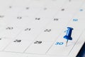 Pin on calendar on 30th of the month Royalty Free Stock Photo